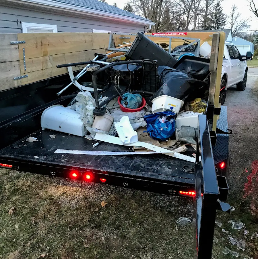 Roll-off dumpster delivered to a residential driveway in Erie